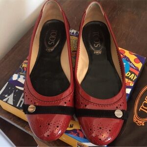 Tod's Red and Black Patent Leather flats with velvet band and button details.